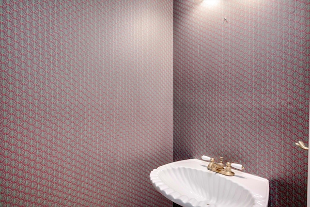 4142 Rivermont Dr, Evans, GA 30809 - bathroom with wallpapered walls and a sink