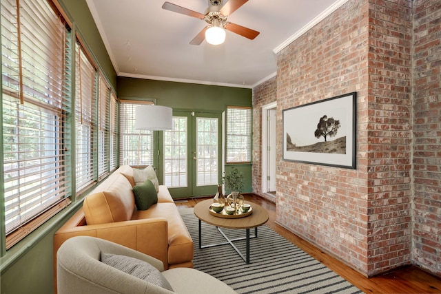 4142 Rivermont Dr, Evans, GA 30809 - sunroom / solarium featuring french doors, wood finished floors, ornamental molding, and brick wall