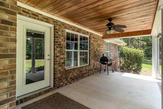 view of patio / terrace with grilling area and ceiling fan