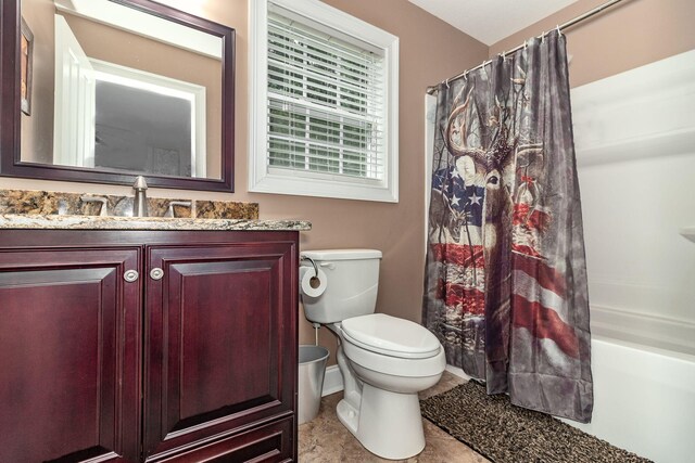 full bathroom featuring vanity, toilet, and shower / bathtub combination with curtain