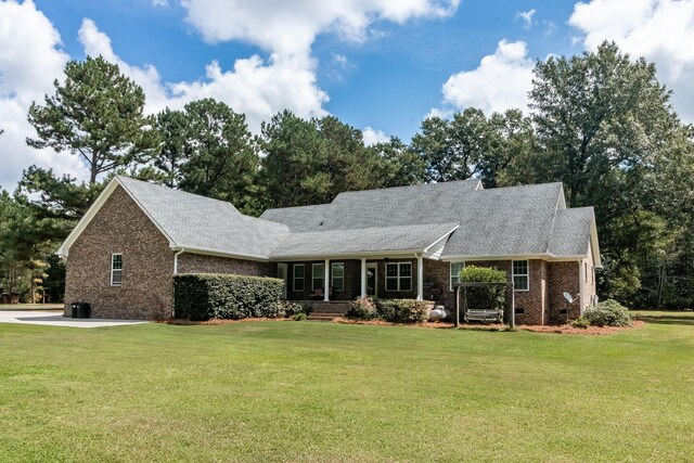 ranch-style home with a front yard