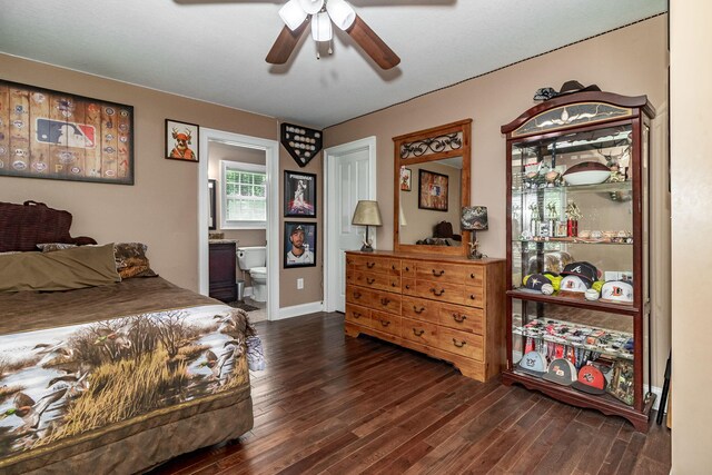 bedroom featuring ensuite bathroom, ceiling fan, and dark hardwood / wood-style floors