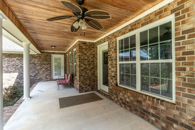 view of patio featuring ceiling fan