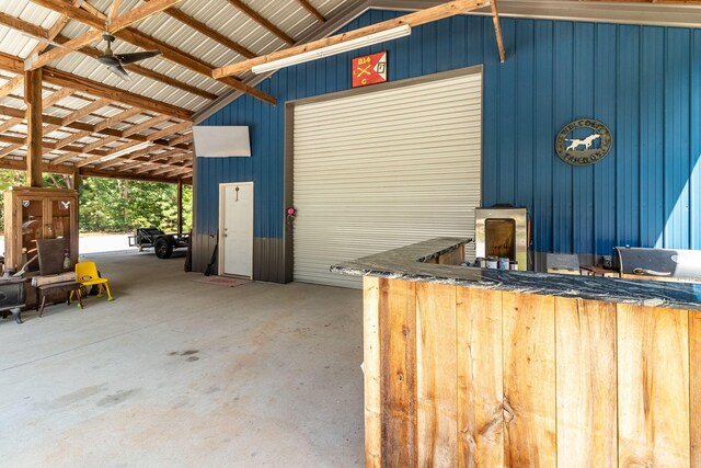 exterior space with ceiling fan