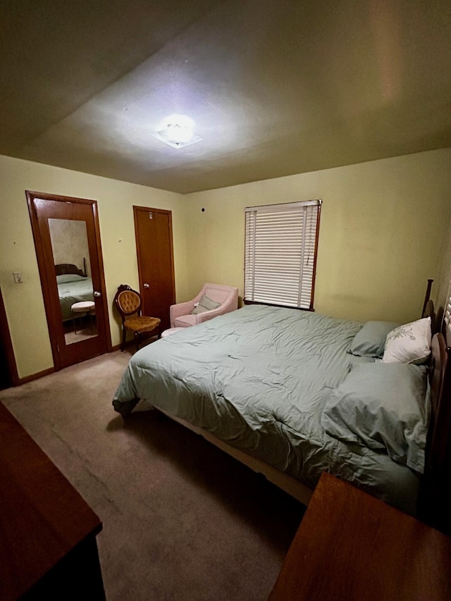 412 W 9th St, Waynesboro, GA 30830 - bedroom featuring baseboards and carpet floors