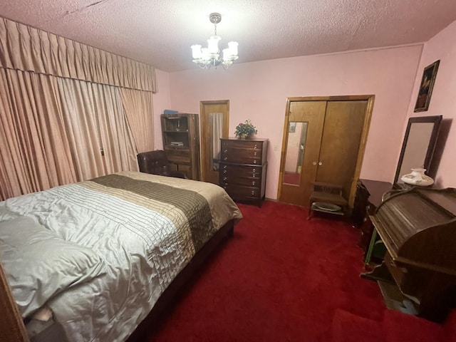 412 W 9th St, Waynesboro, GA 30830 - bedroom with a notable chandelier, carpet, and a textured ceiling