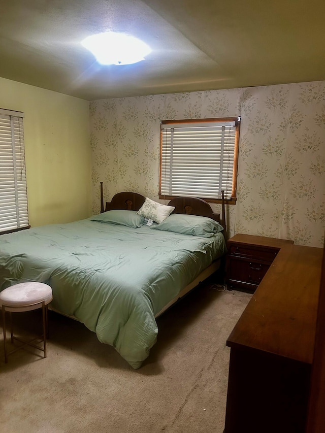 412 W 9th St, Waynesboro, GA 30830 - bedroom featuring carpet floors and wallpapered walls