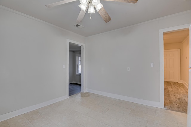 unfurnished room featuring visible vents, baseboards, a ceiling fan, and crown molding