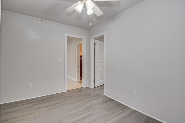 unfurnished room featuring crown molding, ceiling fan, and wood finished floors