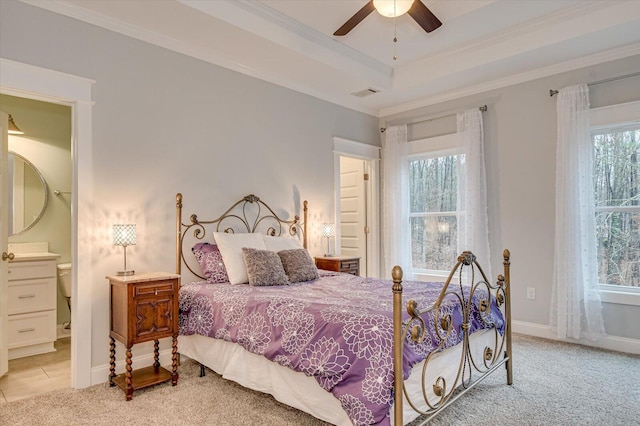 649 Bent Creek Dr, Evans, GA 30809 - bedroom with a tray ceiling, light colored carpet, visible vents, and crown molding