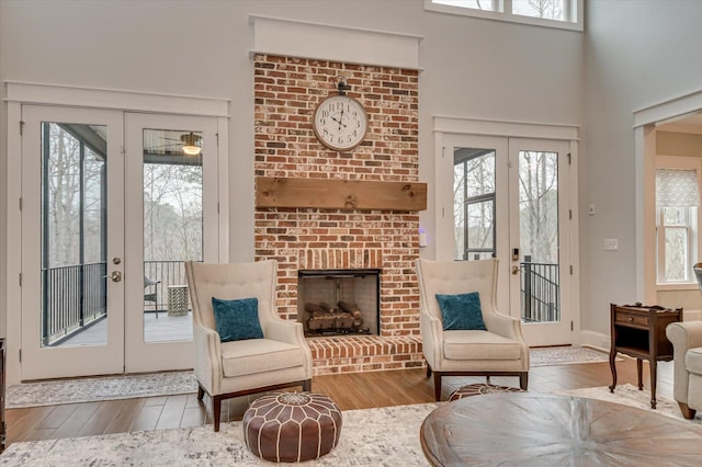 649 Bent Creek Dr, Evans, GA 30809 - living area with a healthy amount of sunlight, french doors, and wood finished floors