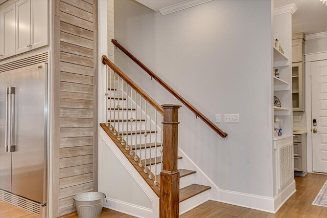649 Bent Creek Dr, Evans, GA 30809 - stairway featuring wood finished floors, baseboards, and ornamental molding