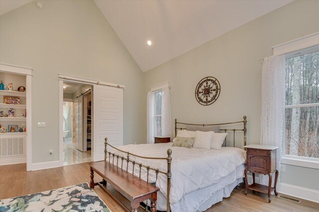 649 Bent Creek Dr, Evans, GA 30809 - bedroom with visible vents, baseboards, and light wood finished floors