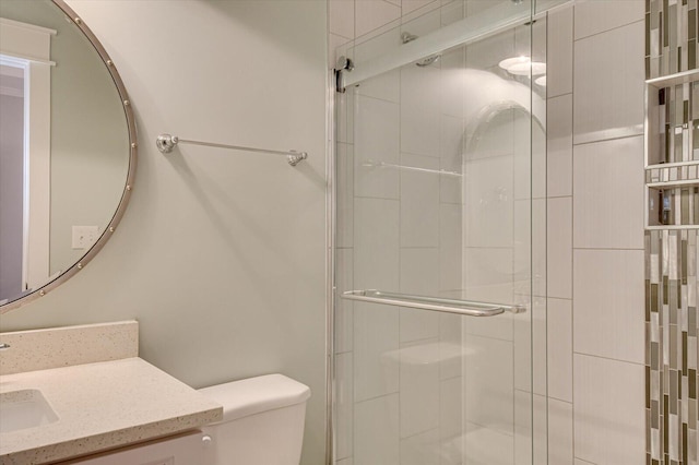 649 Bent Creek Dr, Evans, GA 30809 - bathroom featuring toilet, a stall shower, and vanity