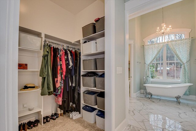 649 Bent Creek Dr, Evans, GA 30809 - spacious closet with marble finish floor and a chandelier