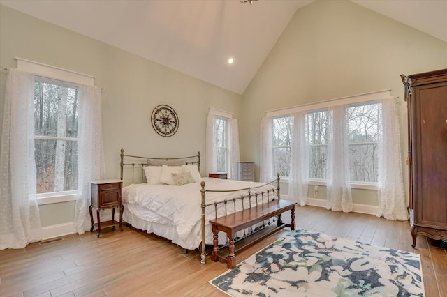 649 Bent Creek Dr, Evans, GA 30809 - bedroom with visible vents, multiple windows, and light wood-style floors