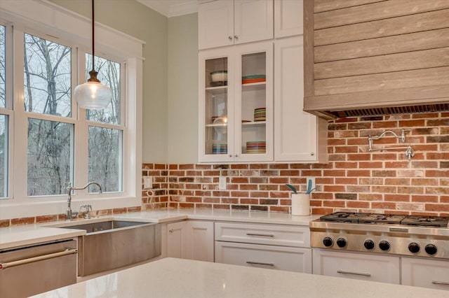 649 Bent Creek Dr, Evans, GA 30809 - kitchen with glass insert cabinets, appliances with stainless steel finishes, a healthy amount of sunlight, and white cabinetry