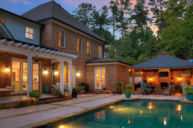 704 Summergate Ct, Augusta, GA 30909 - rear view of property featuring a patio area, a pergola, brick siding, and an outdoor pool