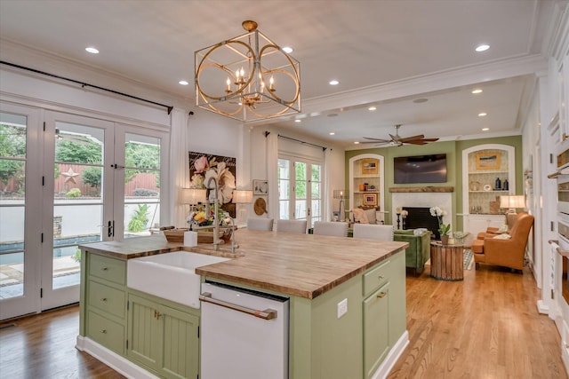 704 Summergate Ct, Augusta, GA 30909 - kitchen featuring green cabinets, butcher block counters, dishwasher, crown molding, and french doors