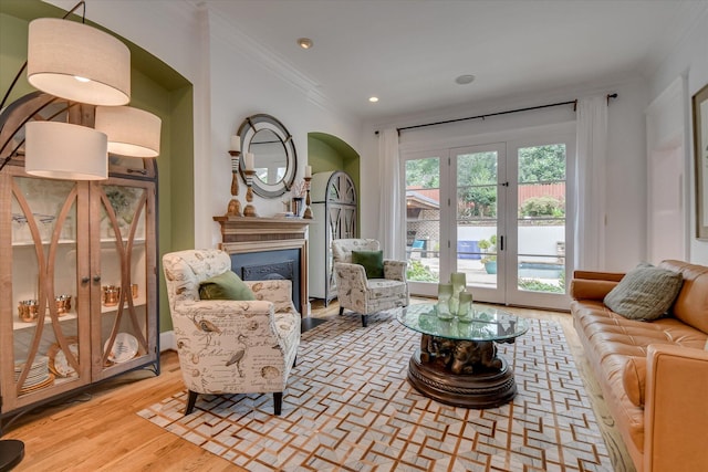 704 Summergate Ct, Augusta, GA 30909 - living area with ornamental molding, a glass covered fireplace, wood finished floors, and recessed lighting