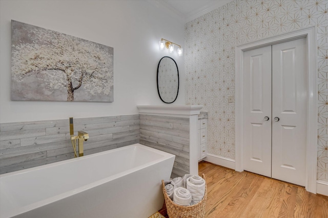 704 Summergate Ct, Augusta, GA 30909 - full bathroom featuring ornamental molding, a soaking tub, and wood finished floors