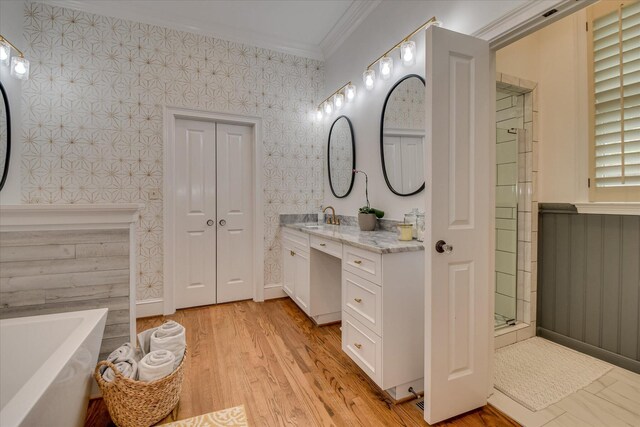 704 Summergate Ct, Augusta, GA 30909 - full bath featuring crown molding, a freestanding tub, vanity, wood finished floors, and a shower with door
