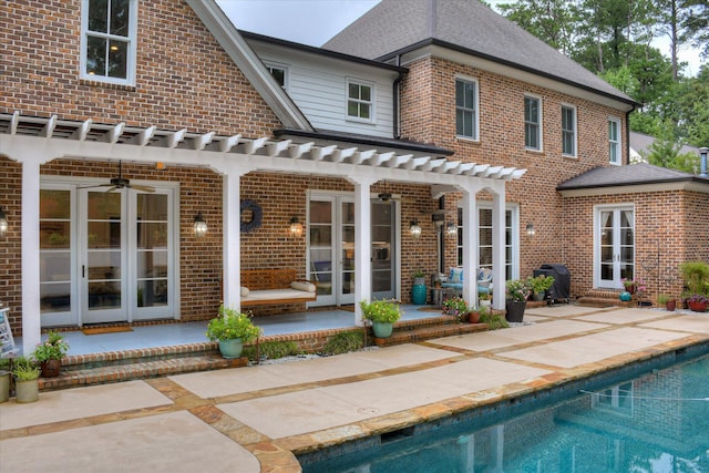704 Summergate Ct, Augusta, GA 30909 - rear view of house featuring a ceiling fan, a patio, french doors, a pergola, and an outdoor pool