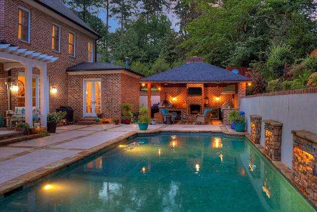 704 Summergate Ct, Augusta, GA 30909 - view of pool with a fireplace and a patio