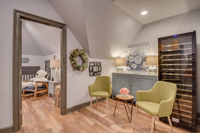 704 Summergate Ct, Augusta, GA 30909 - sitting room with wine cooler, lofted ceiling, wood finished floors, and recessed lighting