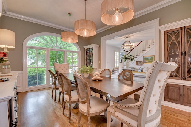 704 Summergate Ct, Augusta, GA 30909 - dining room featuring light wood-style flooring and ornamental molding