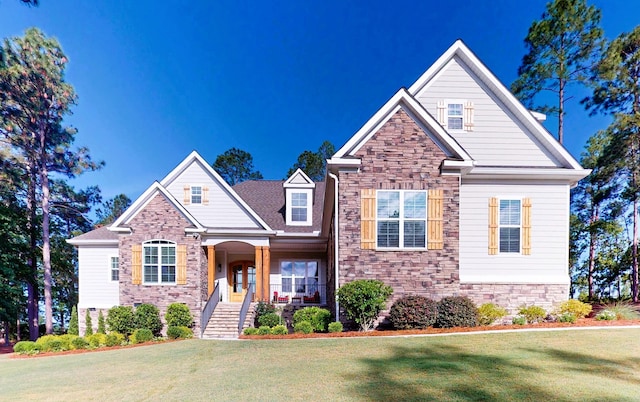 243 Walton Heath Way, Aiken, SC 29803 - view of front of home featuring stone siding and a front lawn