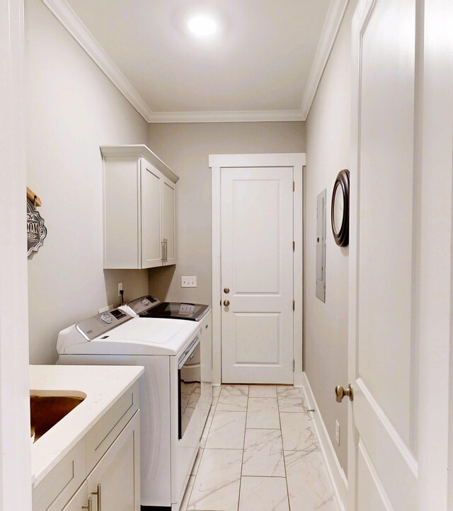 243 Walton Heath Way, Aiken, SC 29803 - washroom featuring separate washer and dryer, cabinet space, light marble finish floors, and ornamental molding