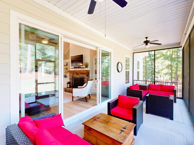 243 Walton Heath Way, Aiken, SC 29803 - sunroom featuring a ceiling fan and an outdoor living space with a fireplace