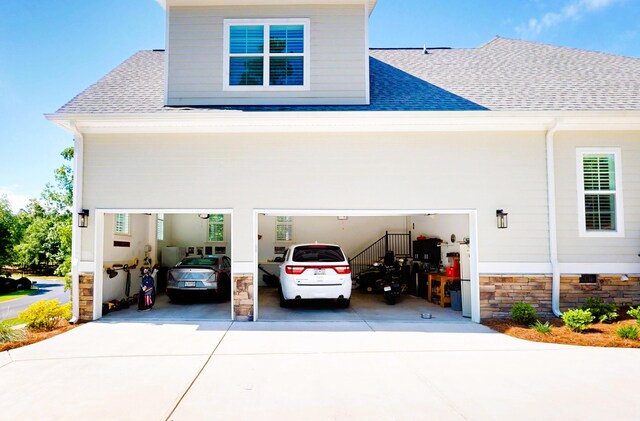 243 Walton Heath Way, Aiken, SC 29803 - view of side of home featuring a shingled roof, concrete driveway, and a garage