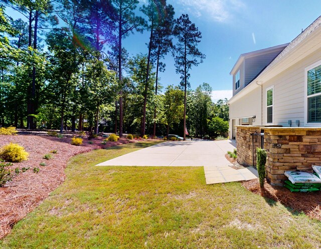 243 Walton Heath Way, Aiken, SC 29803 - view of green lawn with a patio area