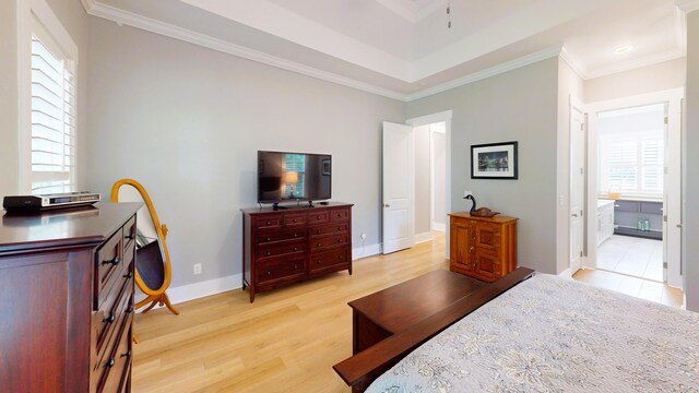 243 Walton Heath Way, Aiken, SC 29803 - bedroom featuring light wood-type flooring, multiple windows, ornamental molding, baseboards, and ensuite bath
