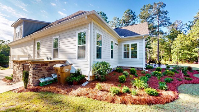 243 Walton Heath Way, Aiken, SC 29803 - view of side of property featuring roof with shingles and area for grilling