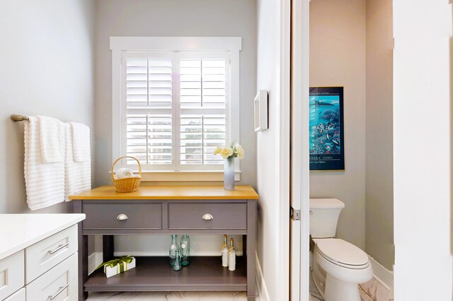 243 Walton Heath Way, Aiken, SC 29803 - bathroom with toilet, vanity, and baseboards