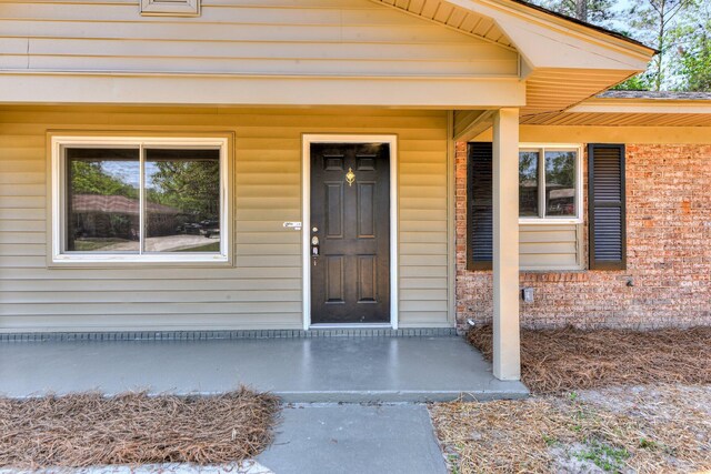 2206 Church Hill Ct, Augusta, GA 30906 - doorway to property featuring a porch and brick siding