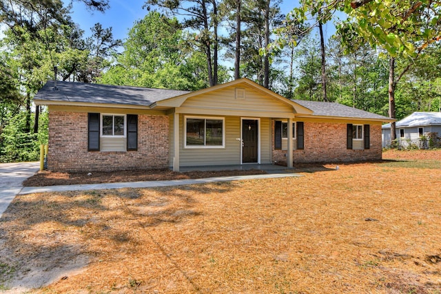 2206 Church Hill Ct, Augusta, GA 30906 - ranch-style house with covered porch, brick siding, and roof with shingles