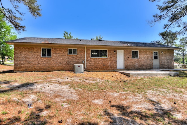 2206 Church Hill Ct, Augusta, GA 30906 - rear view of property featuring brick siding, cooling unit, and a patio