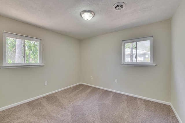 2206 Church Hill Ct, Augusta, GA 30906 - carpeted empty room featuring a textured ceiling, baseboards, and visible vents
