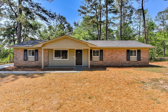 2206 Church Hill Ct, Augusta, GA 30906 - ranch-style house with brick siding, a front yard, and covered porch