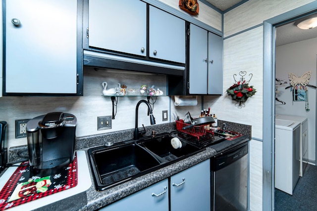 kitchen with washer and dryer, stainless steel dishwasher, gray cabinetry, and sink