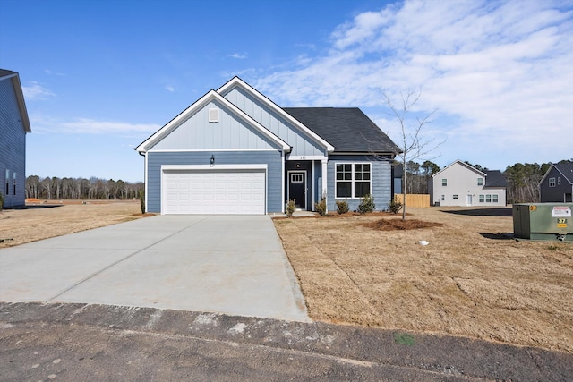 view of front facade featuring board and batten siding, concrete driveway, and a garage