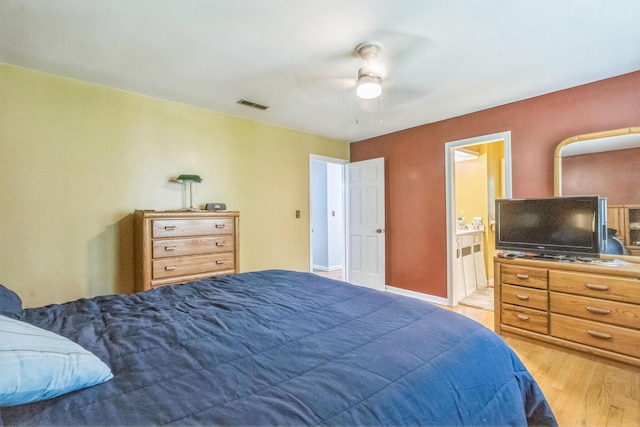 2917 Westchester Ct, Augusta, GA 30909 - bedroom featuring light wood-type flooring, a ceiling fan, and ensuite bath