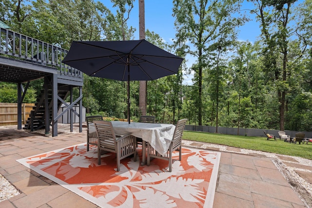 534 Creekridge Rd, Aiken, SC 29803 - view of patio featuring stairway, an outdoor fire pit, outdoor dining space, and a wooden deck