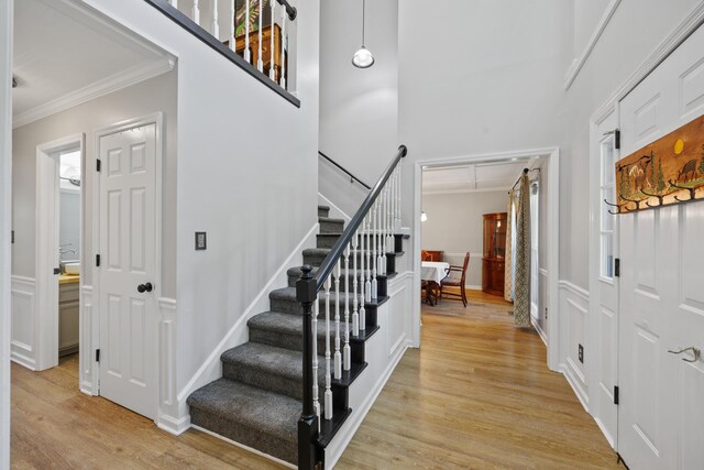 534 Creekridge Rd, Aiken, SC 29803 - foyer with ornamental molding, light wood-style flooring, stairway, and a high ceiling