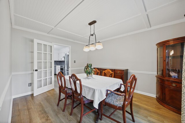 534 Creekridge Rd, Aiken, SC 29803 - dining space featuring wood finished floors, ornamental molding, french doors, and coffered ceiling