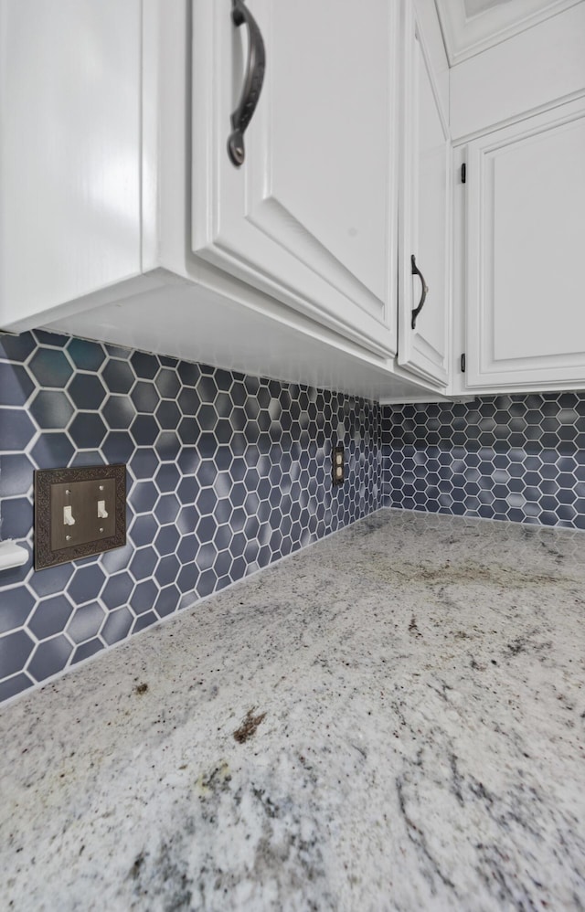 534 Creekridge Rd, Aiken, SC 29803 - kitchen view of white cabinetry, decorative backsplash, and light stone counters